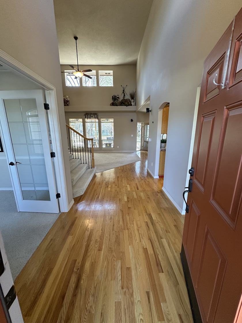 Hardwood entryway with vaulted ceiling installed by Kovo's Karpentry in Boise, Idaho