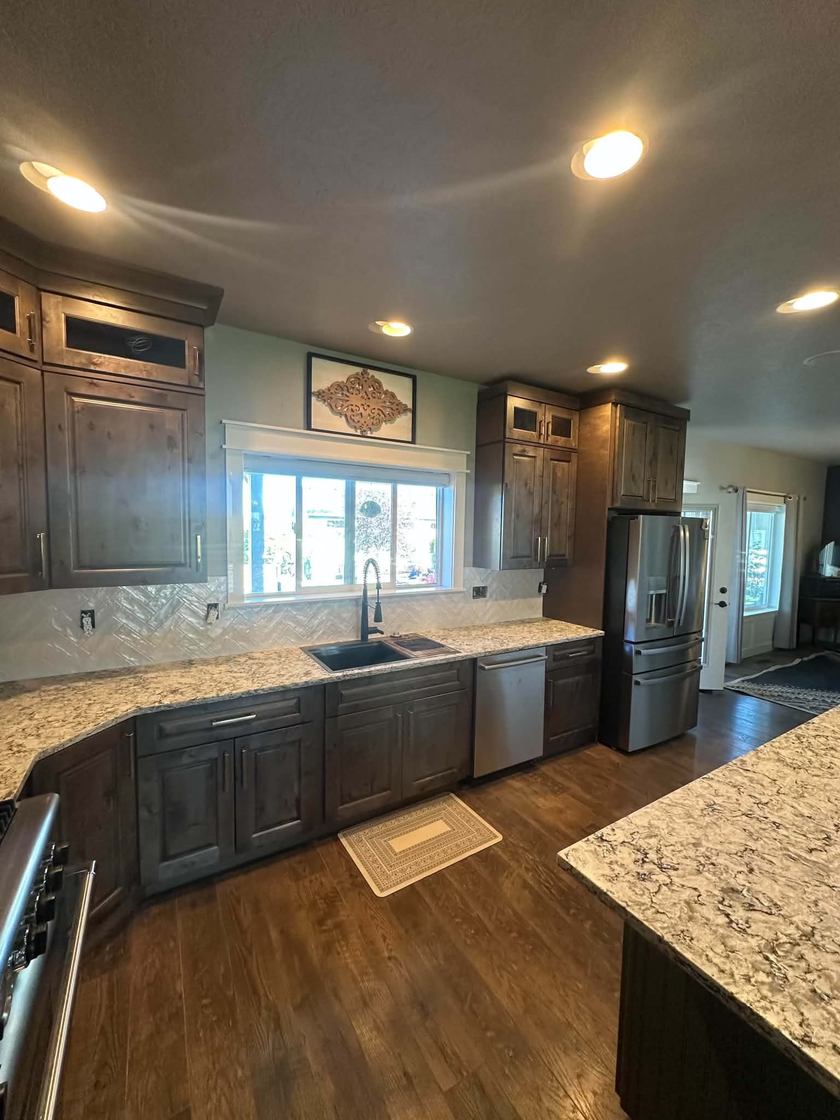Kitchen remodel · granite + window seat — custom tile by Kovo's Karpentry in Boise, Idaho