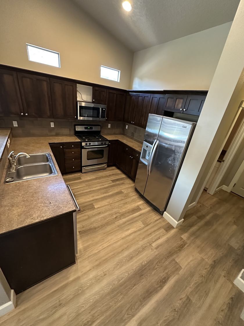 Vaulted kitchen · island + clerestory light — kitchen remodels by Kovo's Karpentry in Boise, Idaho